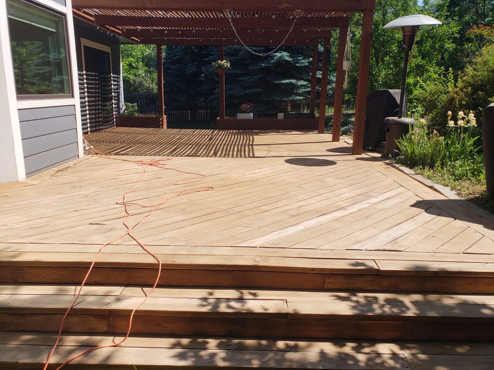 Wood deck cleared and prepped before staining