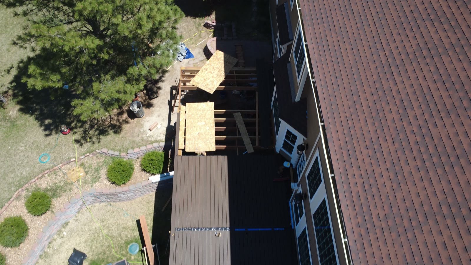 Aerial view of asphalt shingle roof during an exterior check