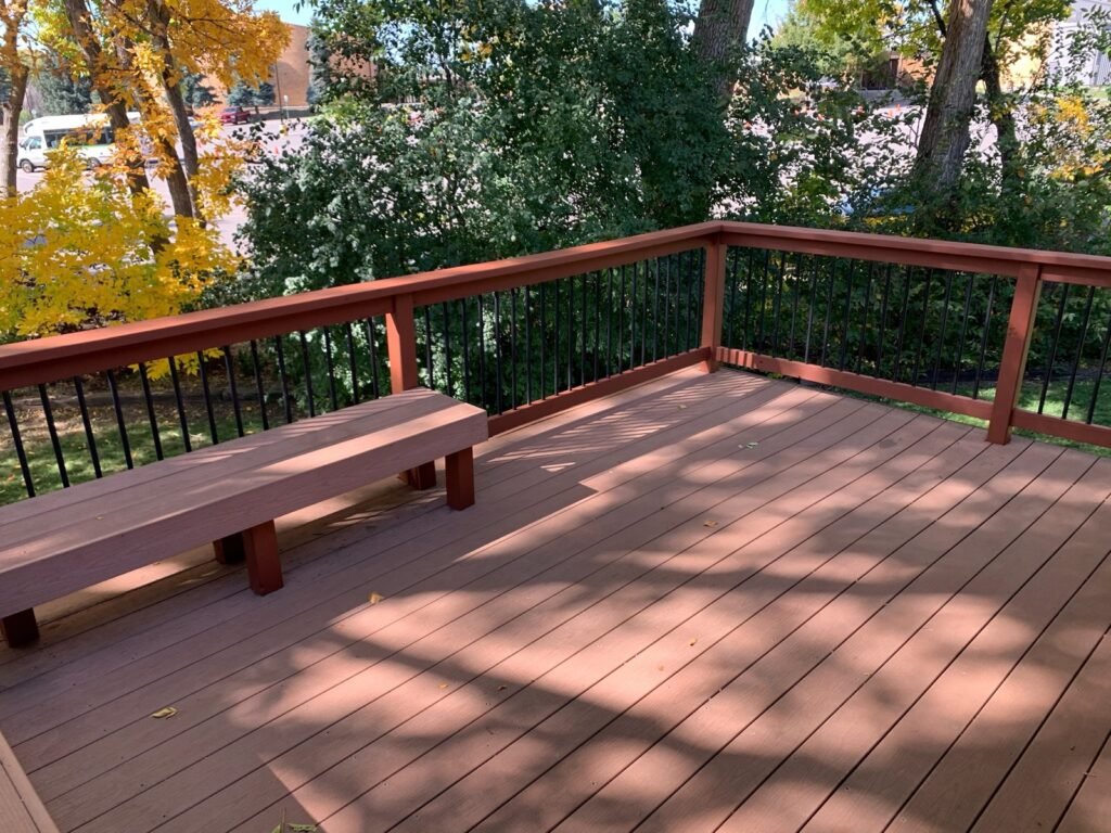 Wide stained deck railing